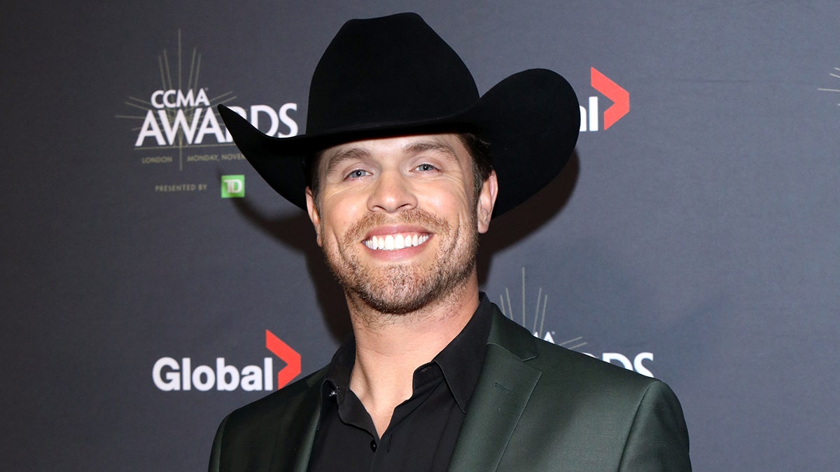 Lights, Camera, Style: Get Your Dustin Lynch Official Merch!